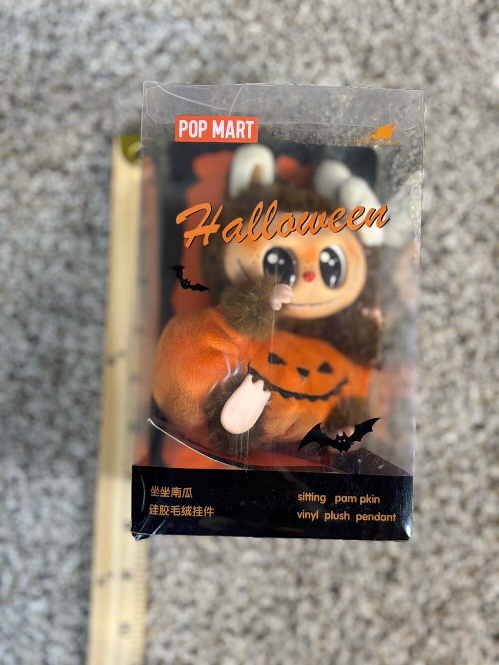 POP MART The Monsters Labubu Hide and Seek Halloween series sitting pumpkin